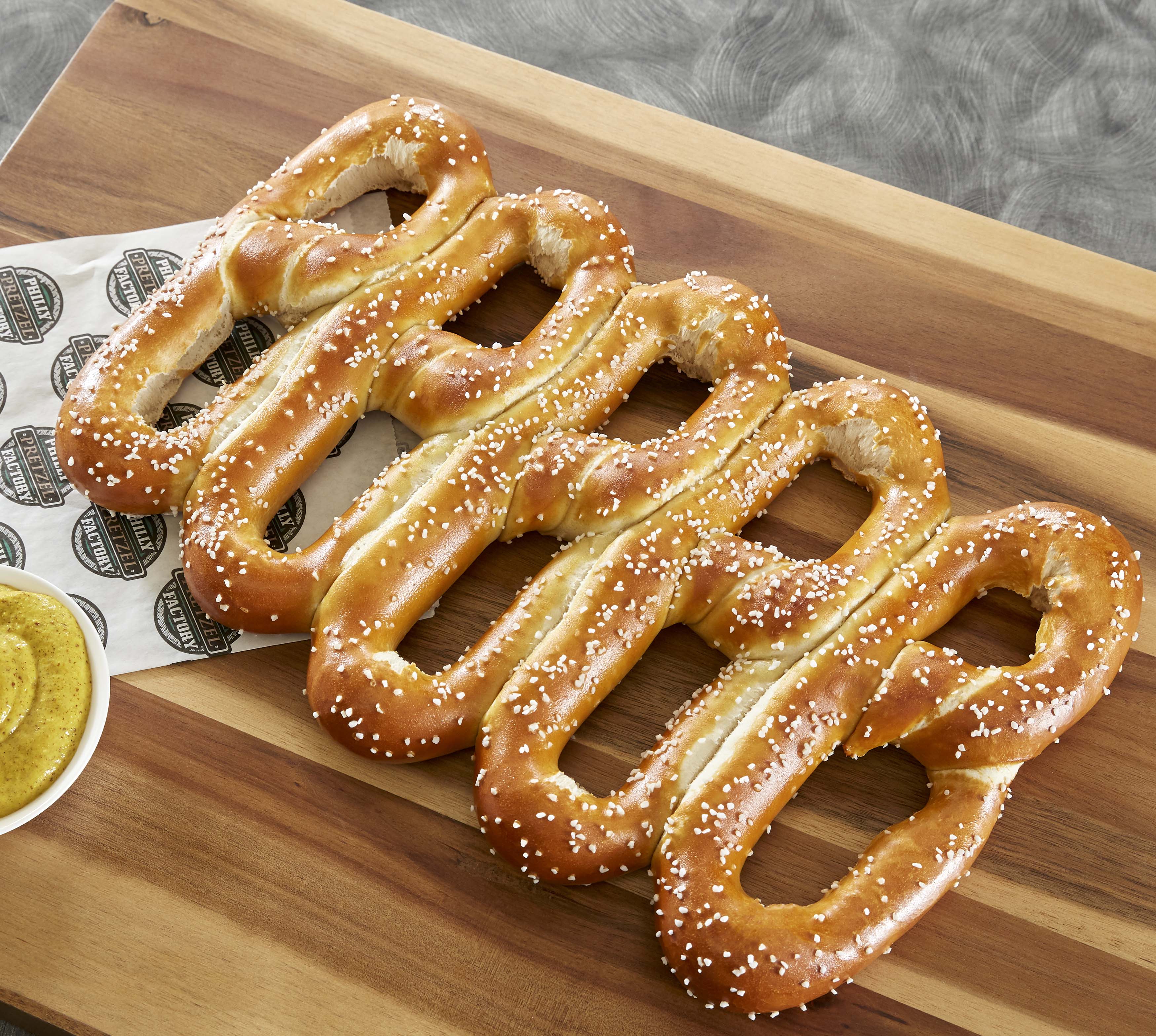 Center City Soft Pretzel Co. in Philadelphia reopening after a fire  destroyed it in 2022 - Axios Philadelphia